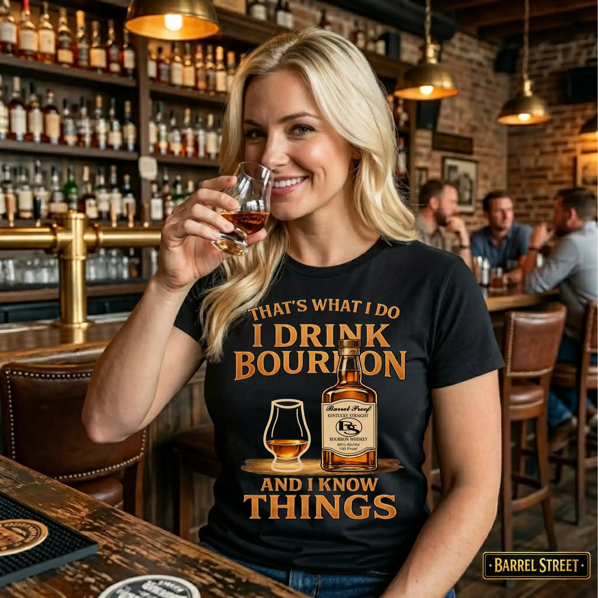 Woman in a bar wearing a t-shirt with a bourbon graphic and text.