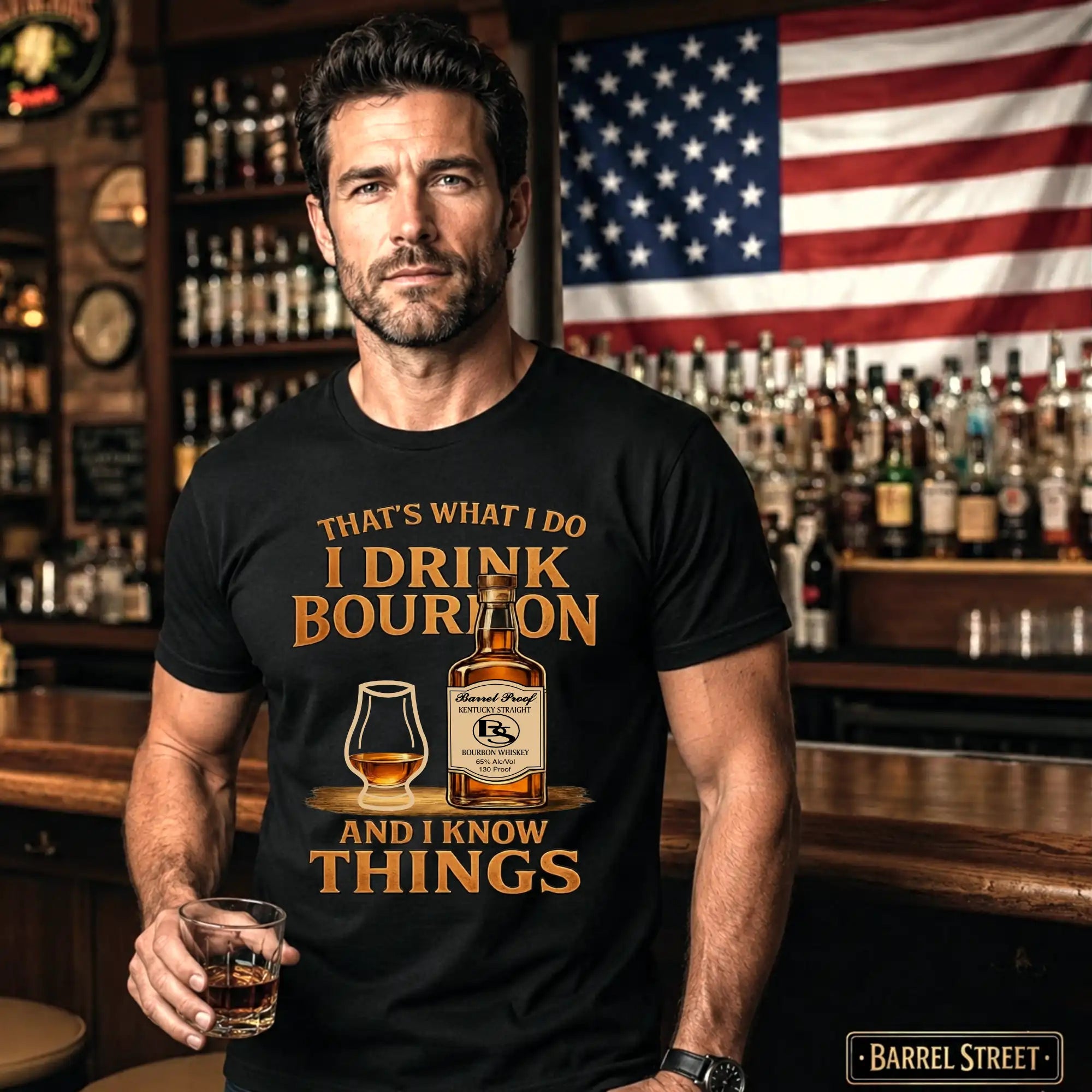 Man wearing a t-shirt with a bourbon-themed design in a bar setting.