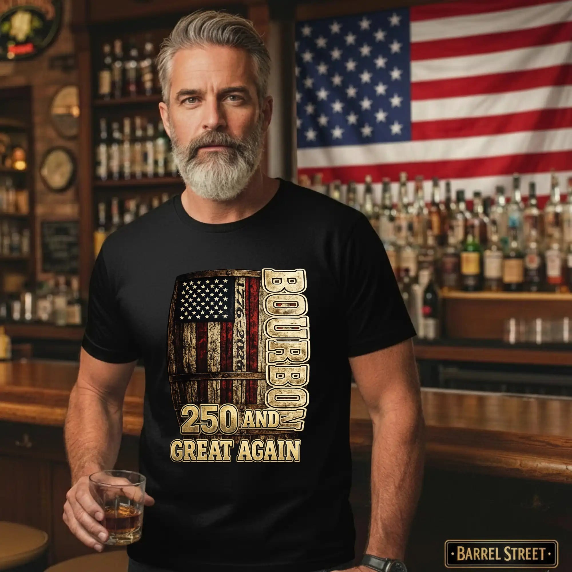 Man wearing a black t-shirt with a barrel design and text in a bar setting with an American flag in the background.